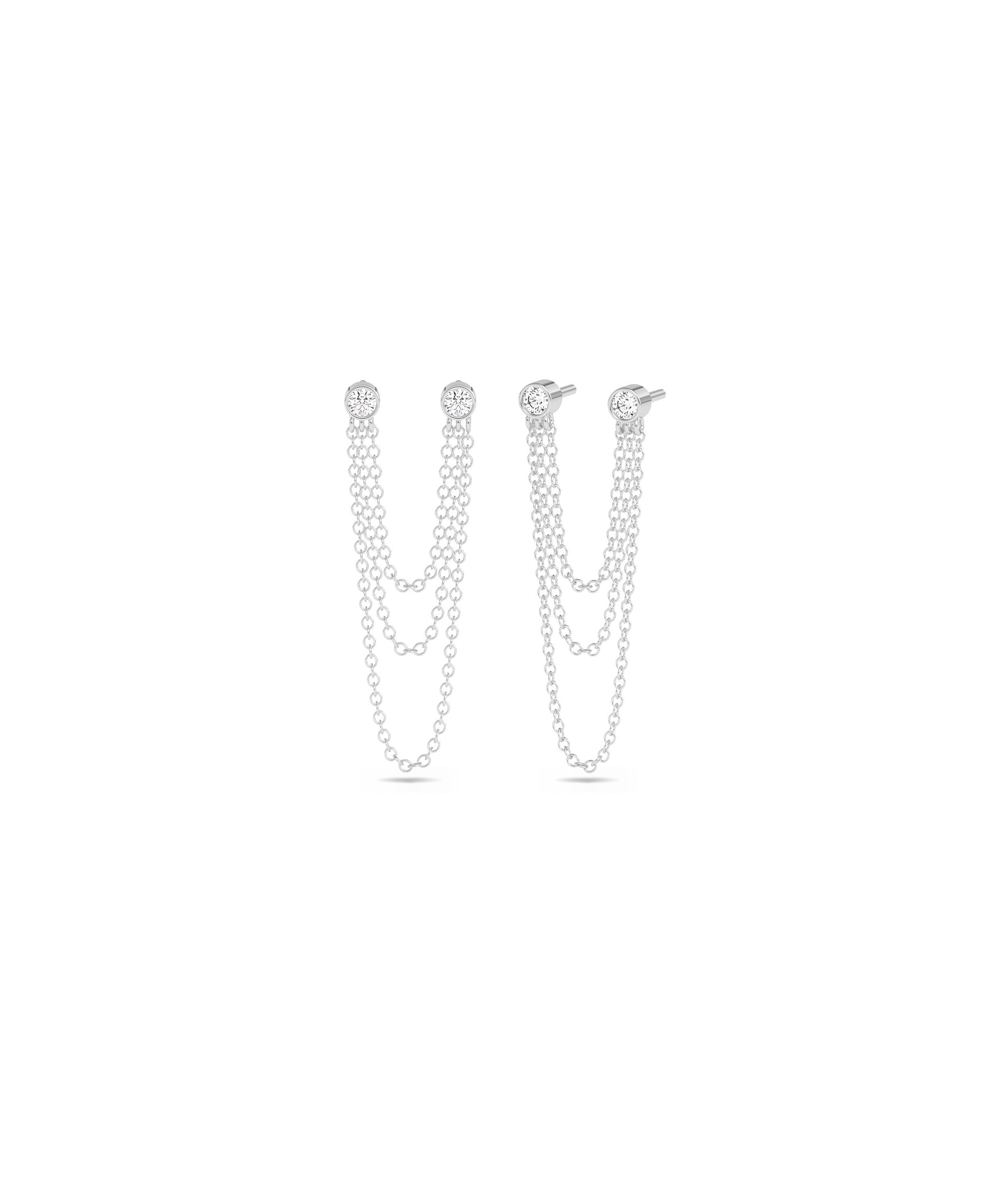 ﻿Discover 2 piercing diamond solitaire stud earrings with a cable chain dangle. Elevate your everyday jewelry collection with this elegant design. Shop now!